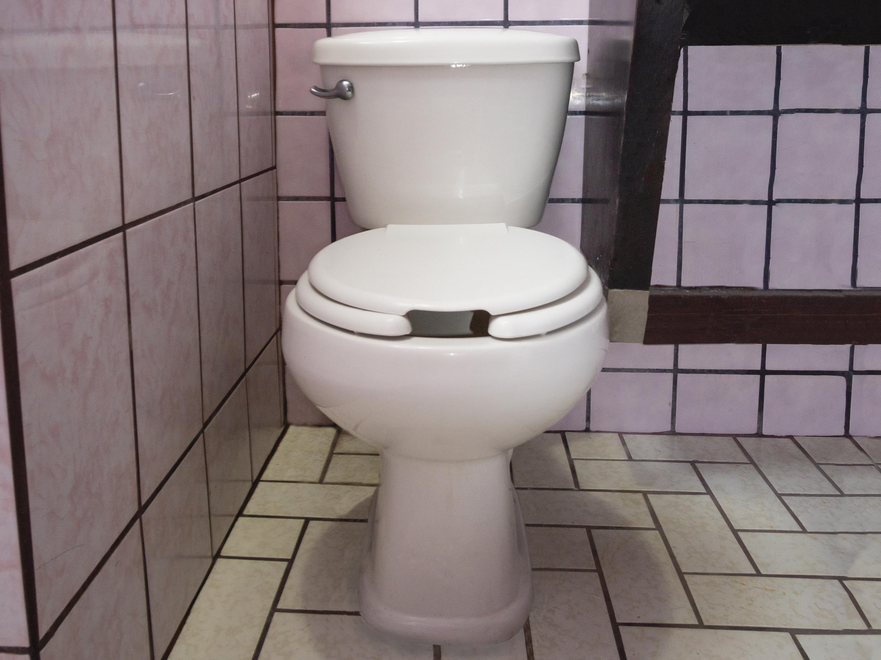 OYO Hotel Hacienda Don Luis, Rosarito Bagian luar foto A two-piece water closet