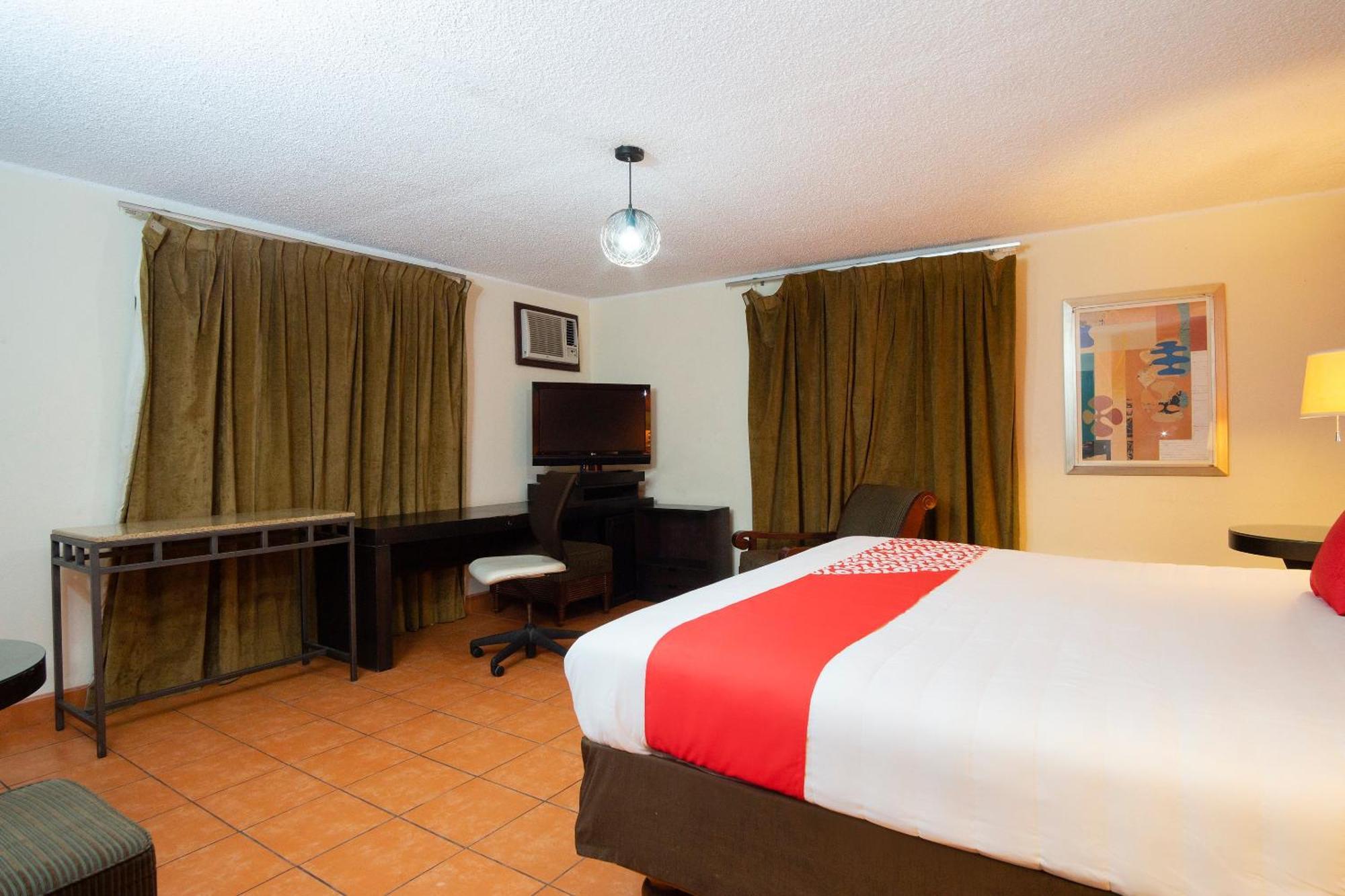 OYO Hotel Hacienda Don Luis, Rosarito Bagian luar foto A typical room at the hotel